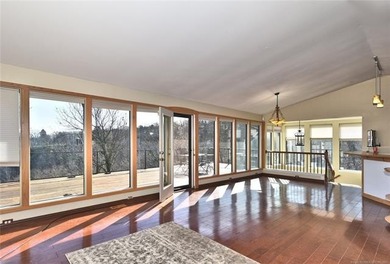 A stunning lake view welcome's you the moment you step inside - photo 5