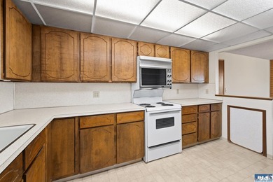 Enjoy easy living in this beautifully situated end-unit condo in - photo 11