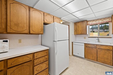 Enjoy easy living in this beautifully situated end-unit condo in - photo 12