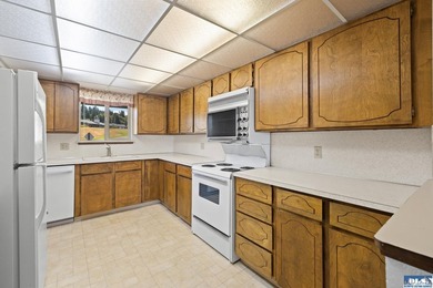 Enjoy easy living in this beautifully situated end-unit condo in - photo 13