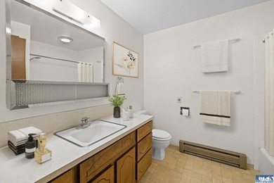 Enjoy easy living in this beautifully situated end-unit condo in - photo 21