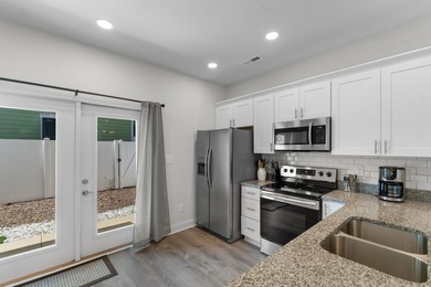 Welcome to 753 Moen Place, a beautifully designed 2-bedroom, 2 - photo 6