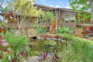 Set on 2 acres of lush, tropical grounds, this is a gorgeous - photo 2