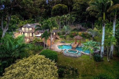 Set on 2 acres of lush, tropical grounds, this is a gorgeous - photo 3