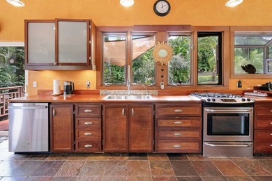 Set on 2 acres of lush, tropical grounds, this is a gorgeous - photo 7