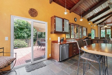 Set on 2 acres of lush, tropical grounds, this is a gorgeous - photo 8