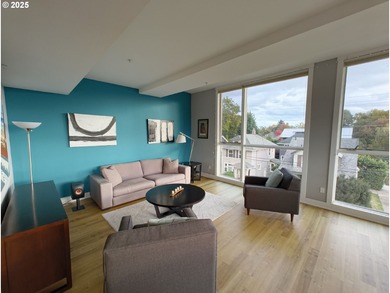 Welcome to 838 SE 38th Ave #307 - a bright and stylish top-floor