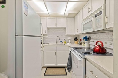 Wake up to the ease and elegance of island living in this