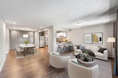 Welcome to this bright and inviting 2 bed, 2 bath, third-floor - photo 1