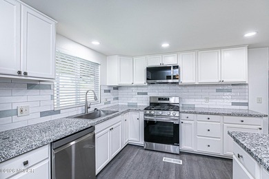 SEEING IS BELIEVING !! This MASTERFUL REMODEL creates an - photo 12