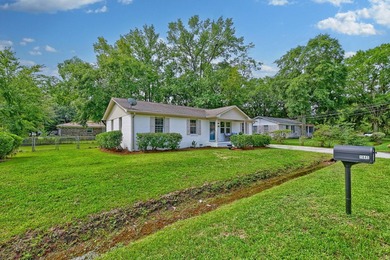 Beautifully renovated brick ranch home tucked away in the heart - photo 13