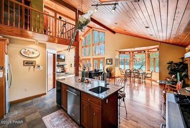 Splendor on the lake! A beautiful manicured, level lot on a - photo 13