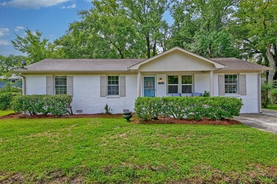 Beautifully renovated brick ranch home tucked away in the heart - photo 14