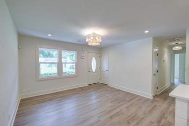 Beautifully renovated brick ranch home tucked away in the heart - photo 15