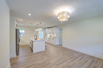 Beautifully renovated brick ranch home tucked away in the heart - photo 16