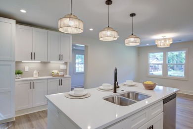 Beautifully renovated brick ranch home tucked away in the heart - photo 19