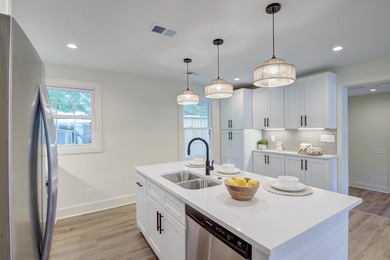 Beautifully renovated brick ranch home tucked away in the heart - photo 20