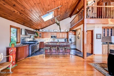 Splendor on the lake! A beautiful manicured, level lot on a - photo 21
