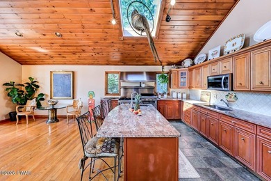 Splendor on the lake! A beautiful manicured, level lot on a - photo 22