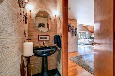 Splendor on the lake! A beautiful manicured, level lot on a - photo 25