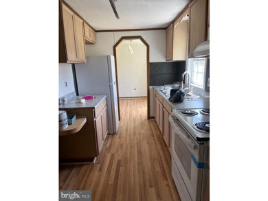 This completely remodeled home features 3 Spacious bed- rooms, 2 - photo 25