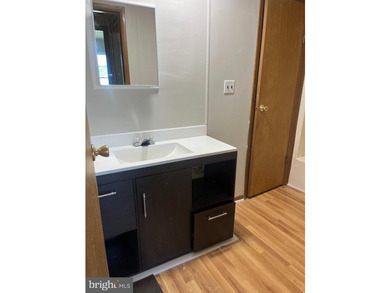 This completely remodeled home features 3 Spacious bed- rooms, 2 - photo 27