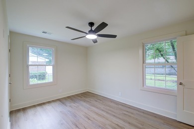 Beautifully renovated brick ranch home tucked away in the heart - photo 29