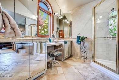 Splendor on the lake! A beautiful manicured, level lot on a - photo 31