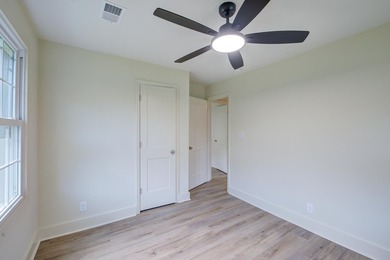 Beautifully renovated brick ranch home tucked away in the heart - photo 34