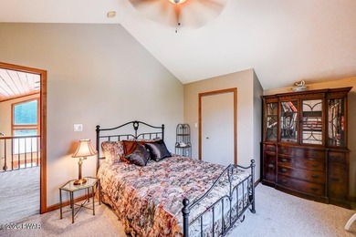 Splendor on the lake! A beautiful manicured, level lot on a - photo 40