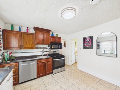 Take a look at this well-maintained owner-occupied two-family - photo 14