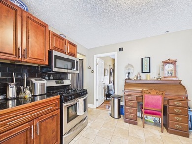 Take a look at this well-maintained owner-occupied two-family - photo 31