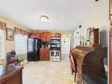Take a look at this well-maintained owner-occupied two-family - photo 32