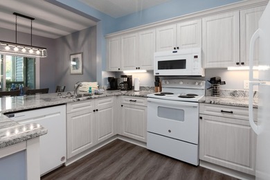 Nice two bedroom, two bath Canterbury Court condo located on a - photo 6