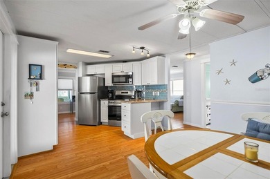 Surfside Estates in Beverly Beach, Florida, is a charming 55+ - photo 8