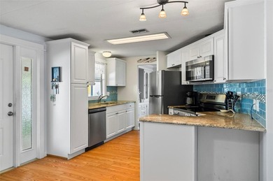 Surfside Estates in Beverly Beach, Florida, is a charming 55+ - photo 9