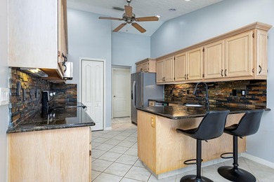 Move-in ready 3/2 pool home with no HOA in Port St. Lucie! This - photo 10
