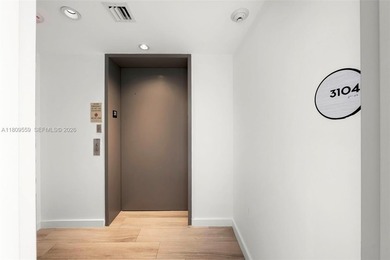 Welcome to One Paraiso 3104. Private elevator access opens up to