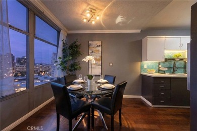 This stylish 1-bedroom, 1-bathroom condo in The Royal Palms is - photo 1