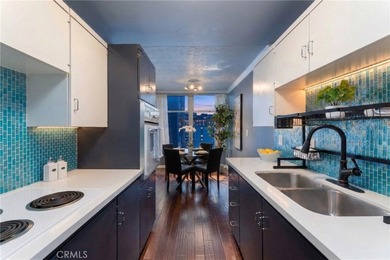 This stylish 1-bedroom, 1-bathroom condo in The Royal Palms is - photo 3
