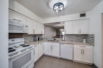 2/2 remodeled 55+ plus community. White Kitchen, New Tile, Wood - photo 7