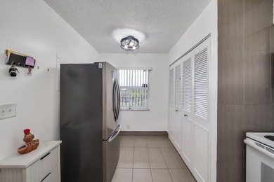 2/2 remodeled 55+ plus community. White Kitchen, New Tile, Wood - photo 8