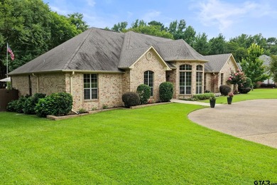 Beautiful brick home situated on a desirable corner lot in a - photo 2