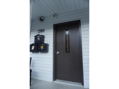 Beautifully newly renovated two-family frame house featuring a - photo 3