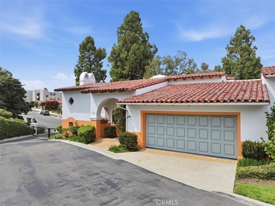 Feel right at home in this timeless Spanish-style condominium - photo 1