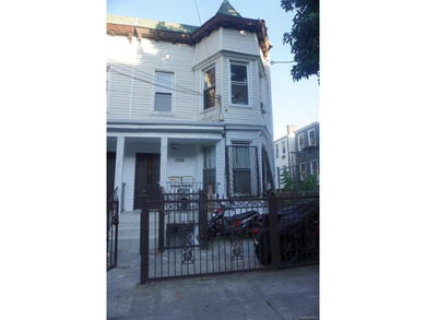 Charming and well-maintained two-family frame house featuring a - photo 2