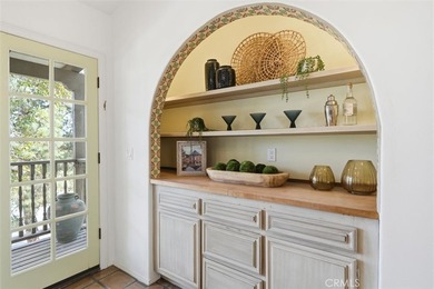 Feel right at home in this timeless Spanish-style condominium - photo 5