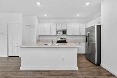 GORGEOUS CORNER UNIT W/ OPEN FLOOR PLAN & PLENTY OF WINDOWS - photo 4