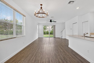 GORGEOUS CORNER UNIT W/ OPEN FLOOR PLAN & PLENTY OF WINDOWS - photo 8
