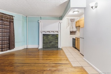 Exceptional brownstone six-unit multi-family building offering a - photo 3
